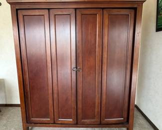 wood desk with privacy doors