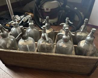 10 Old Seltzer Bottles In Rack