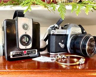 ($40- on left, Vintage Brownie Hawkeye flash camera), ($30- Asahi Pentax Spotmatic camera), ($30- Camera bangle bracelet, Luca and Danni, new, never worn.)