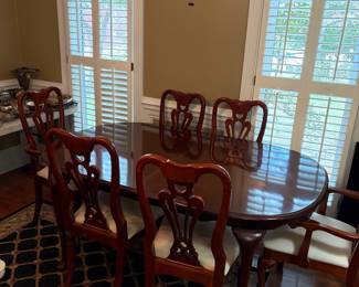 	#4		Dining room table with six chairs, two captain chairs. And with 2, 16 inch leaves.  66-90 x 44 x 30 	 $ 225.00 		