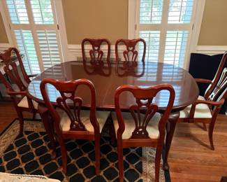 	#4		Dining room table with six chairs, two captain chairs. And with 2, 16 inch leaves.  66-90 x 44 x 30 	 $ 225.00 		