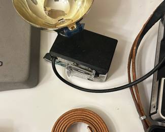 	#107	RA	Two vintage Polaroid cameras with accessories model 210 and 250. -untested	 $ 25.00 		