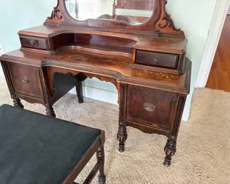 	#12		Antique vanity w/large beveled mirror - two pieces with vanity stool. Four drawers  - 46 1/2 x 18 x 68 	 $ 150.00 																							