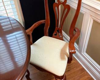 	#4		Dining room table with six chairs, two captain chairs. And with 2, 16 inch leaves.  66-90 x 44 x 30 	 $ 225.00 		