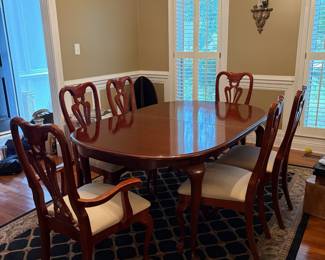 	#4		Dining room table with six chairs, two captain chairs. And with 2, 16 inch leaves.  66-90 x 44 x 30 	 $ 225.00 		