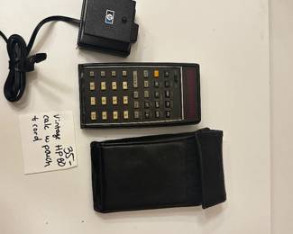 	#108	RA	Hewlett-Packard HP 80 calculator with pouch and power source -untested	 $ 35.00 		