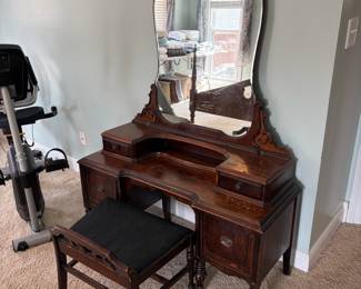 	#12		Antique vanity w/large beveled mirror - two pieces with vanity stool. Four drawers  - 46 1/2 x 18 x 68 	 $ 150.00 																							