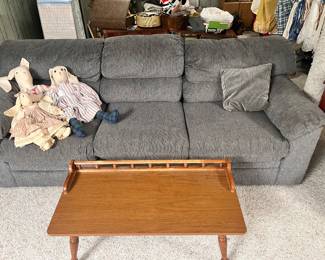 Gray sofa and maple coffee table