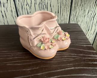 Vintage pink baby shoe flower vase