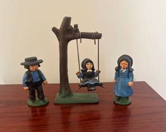 Cast iron Amish couple with child on