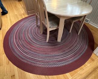 kitchen table, colorful knitted rug