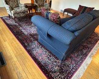 living room furniture, decor, mirror, carpet, paintings, floor lamps