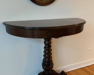 antique carved wooder half moon table