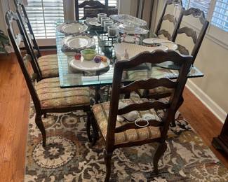 Lovely glass and iron table with 6 chairs