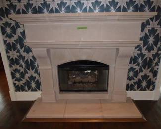 2-Lime Stone Fireplace with Surround, 6’w x 5’t. $2,750.00 each.