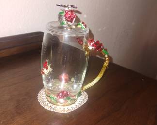 Rose decorated tea cup with coaster