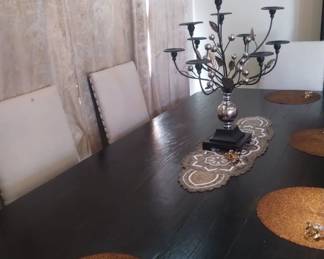 Gorgeous canelabra on dark wood table seats 6