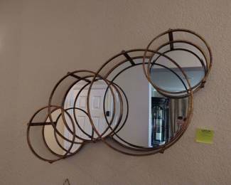 Oval mirror wall hanging