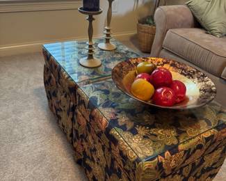 Two glass covered table