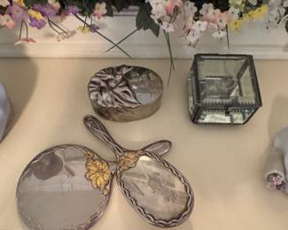Silver mirror and brush