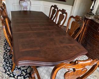 Dining room table with eight chairs