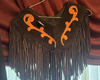 Leather front poncho drape