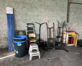 hardwood flooring, trash cans, step ladders, step stools, barrel dollies, bike rack, gas cans with storage locker
