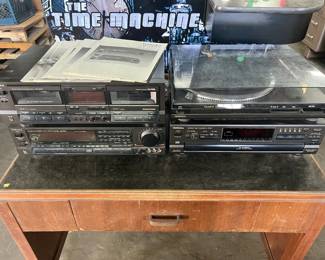 classic Technics full stereo setup - receiver, tape deck, CD player, and record turntable