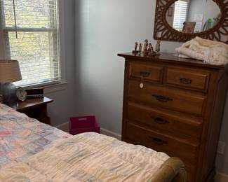 Solid wood chest, matching end table, vintage wall mirror, quilts