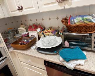 More kitchen miscellaneous. Cookie canisters. Crystal bowls, stainless steel pots, cookbooks, and more!