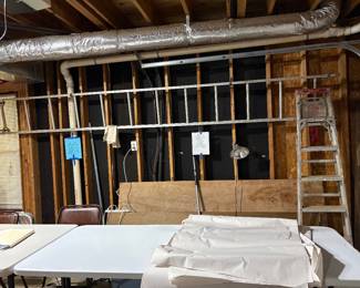 Ladders and survey equipment