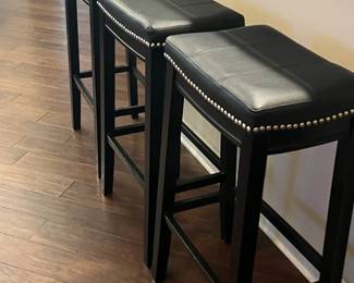 Three matching bar stools