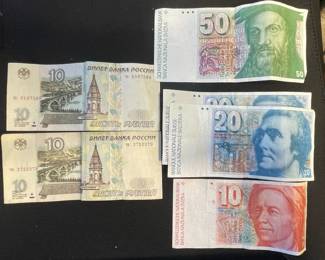 Mixed Currency Banknotes: Russian Rubles and Swiss Francs