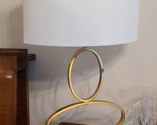 Modern Abstract Oval Table Lamp with Brushed Gold Finish and Acrylic Base