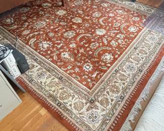 Rust Oriental Rug with Floral and Paisley Motifs
