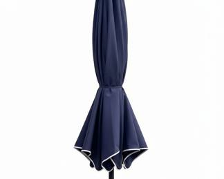 Navy Blue Patio Umbrella with White Piping and Ornate Base