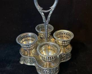 Antique Possibly Victorian-era silver-plated egg cruet set, typically used for serving boiled eggs.