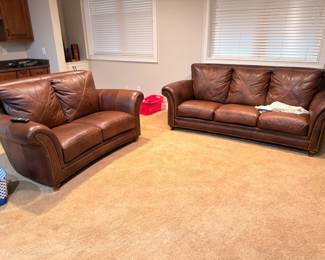 Brown leather sofa and loveseat set