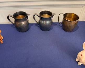Antique silverplate creamers and small pitcher