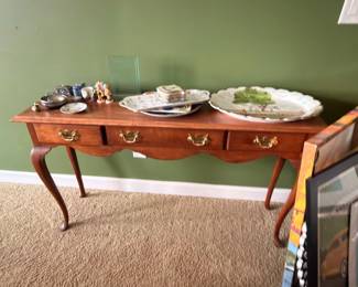 Cherry Queen Anne buffet table with china and glassware