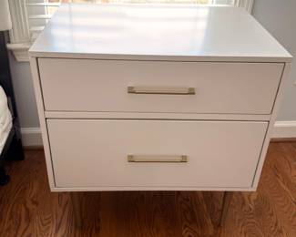 White modern nightstand with chrome handles