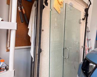 Glass shower doors and assorted garage storage items