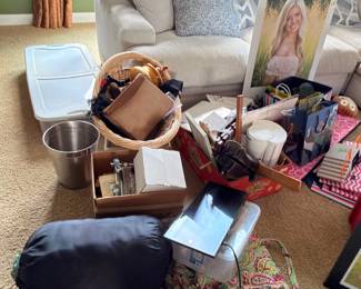 Assorted home decor, pillows, bags, and frames