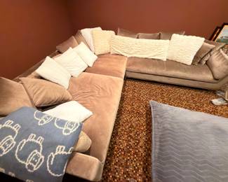 L-shaped sectional sofa with decorative pillows