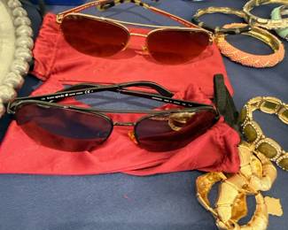 Designer aviator sunglasses and gold link belt