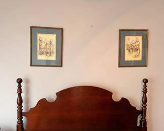 Four-poster bed headboard, dark wood with framed prints