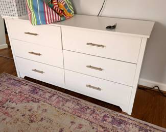 White modern dresser with chrome handles