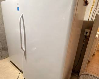 White upright freezer