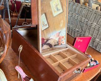 Antique wooden jewelry box with mirror
