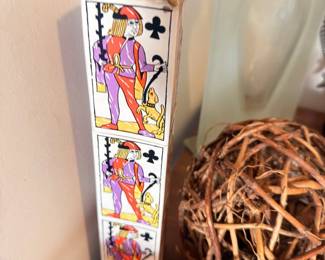 Decorative playing card motif vase and wicker basket